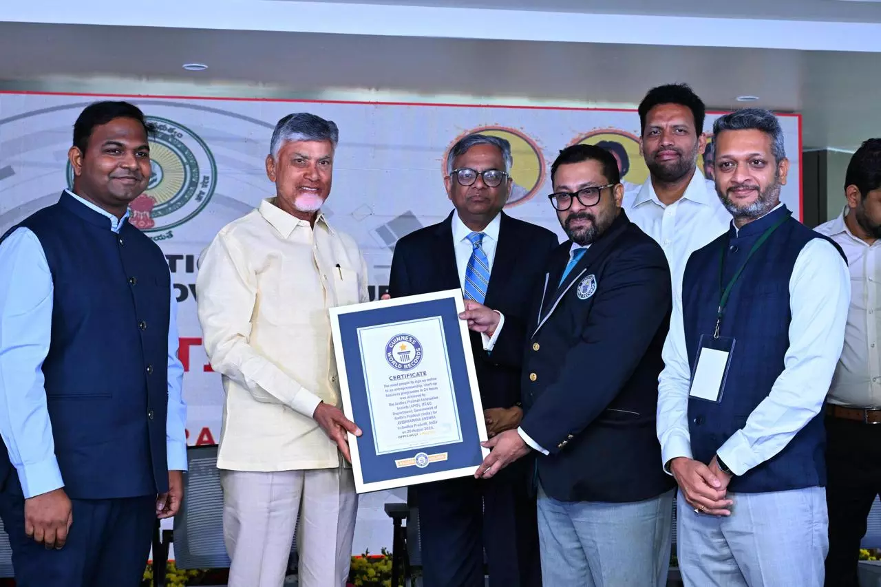 Sri Nara Chandrababu Naidu and officials holding a Guinness World Records certificate